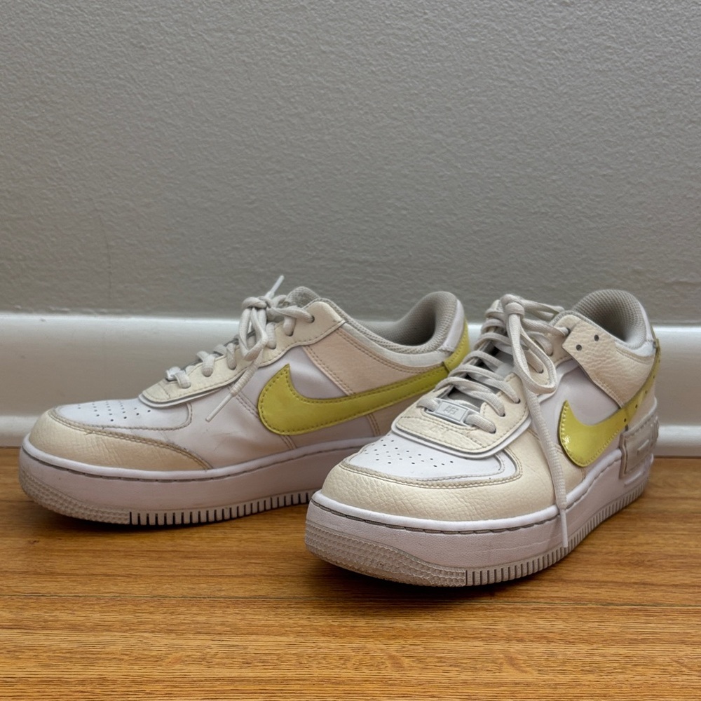 Nike Cream Sneakers with Yellow Swoosh